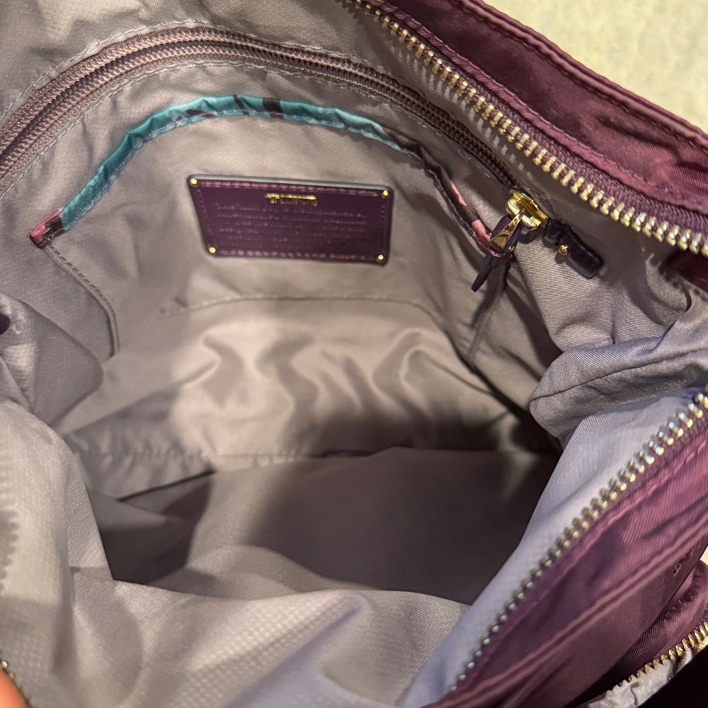 TUMI
Voyageur Capri Crossbody plum purple color in GUC - Picture 7 of 12